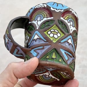 Amy-Joy-Hosterman_Main-Image_Magical-Mountain-Mug_5x4in_Wild-SD-Clay